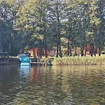 A Single-Story Holiday Home Right By The Lake * Grabczyn