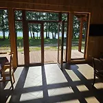 A Single-Story Holiday Home Right By The Lake